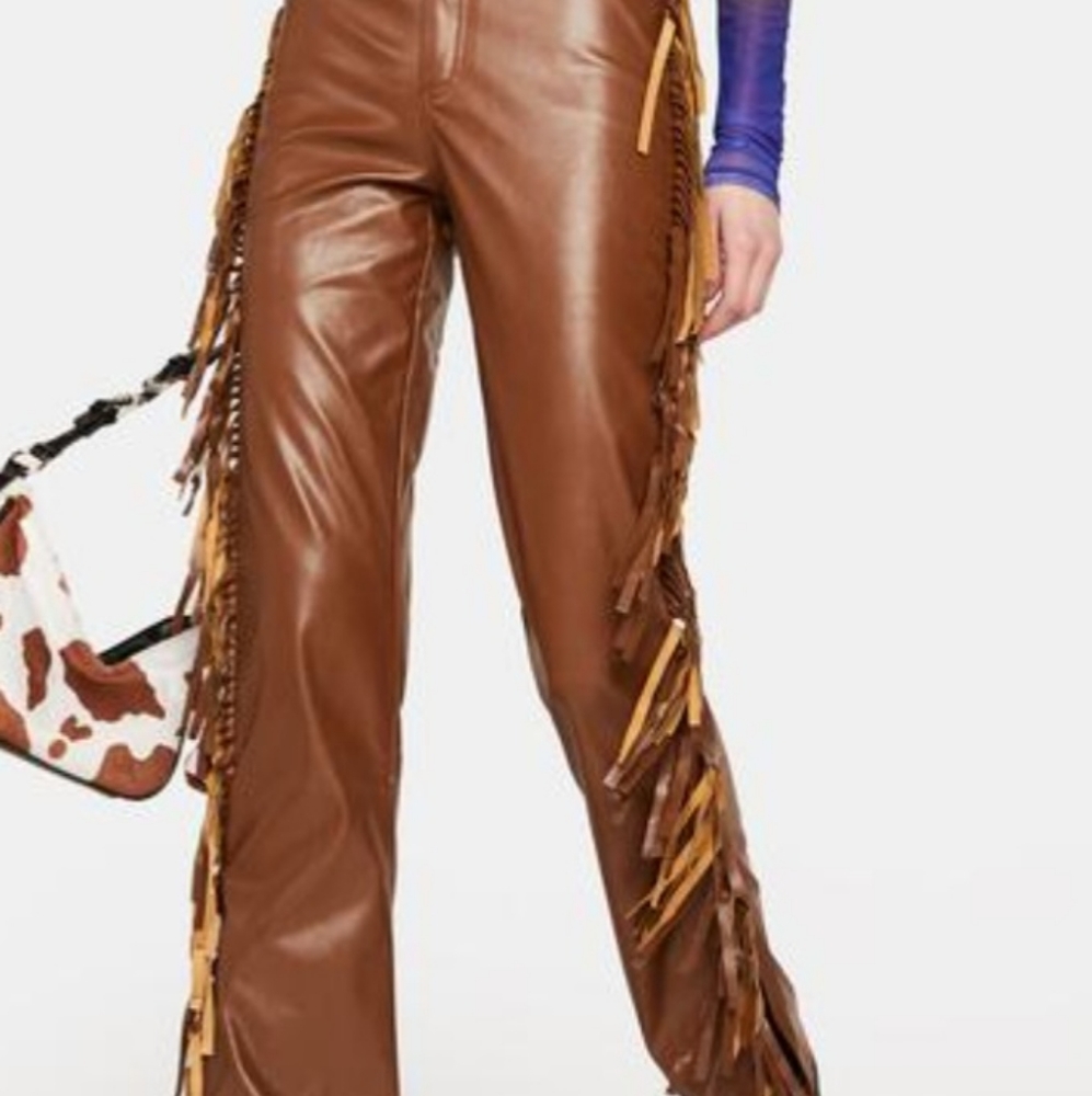 Hot & Delicious Mocha fringe pants have a vegan leather construction high rise.